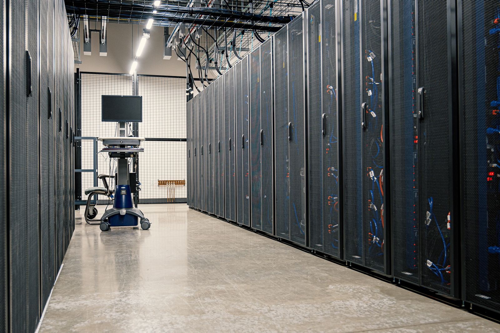 Server racks and overhead cabling in a data centre